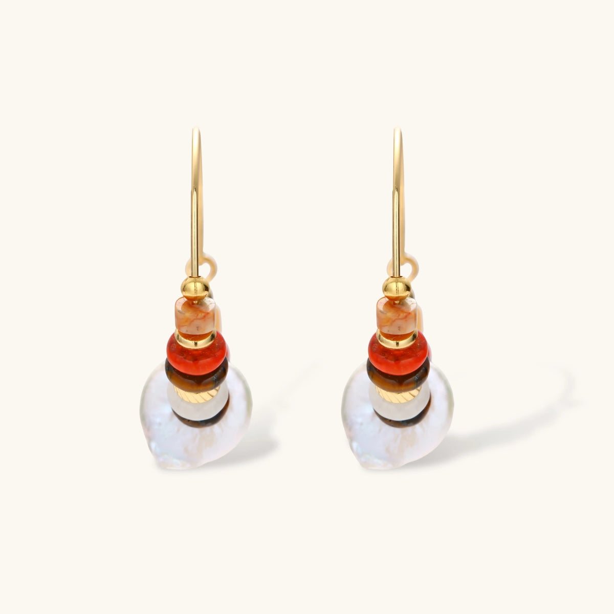 18k gold-plated earrings featuring baroque pearls and colorful natural stones in a stacked design on cream background.